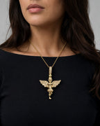 Female model wearing 10K Baby Angel Diamond Pendant 1.1"