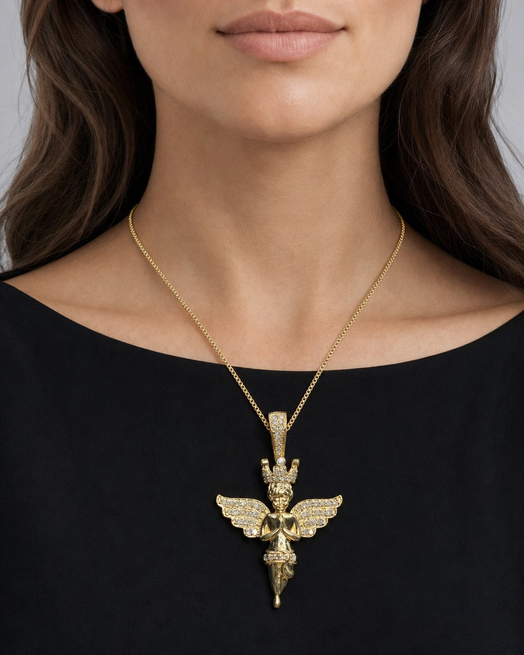 Female model wearing 10K Baby Angel Diamond Pendant 1.3"
