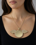 Female model wearing 10K Circle Angel Wings Picture Photo Pendant