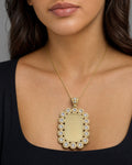 Female model wearing 10K Rounded Rectangle Flower Picture Photo Pendant