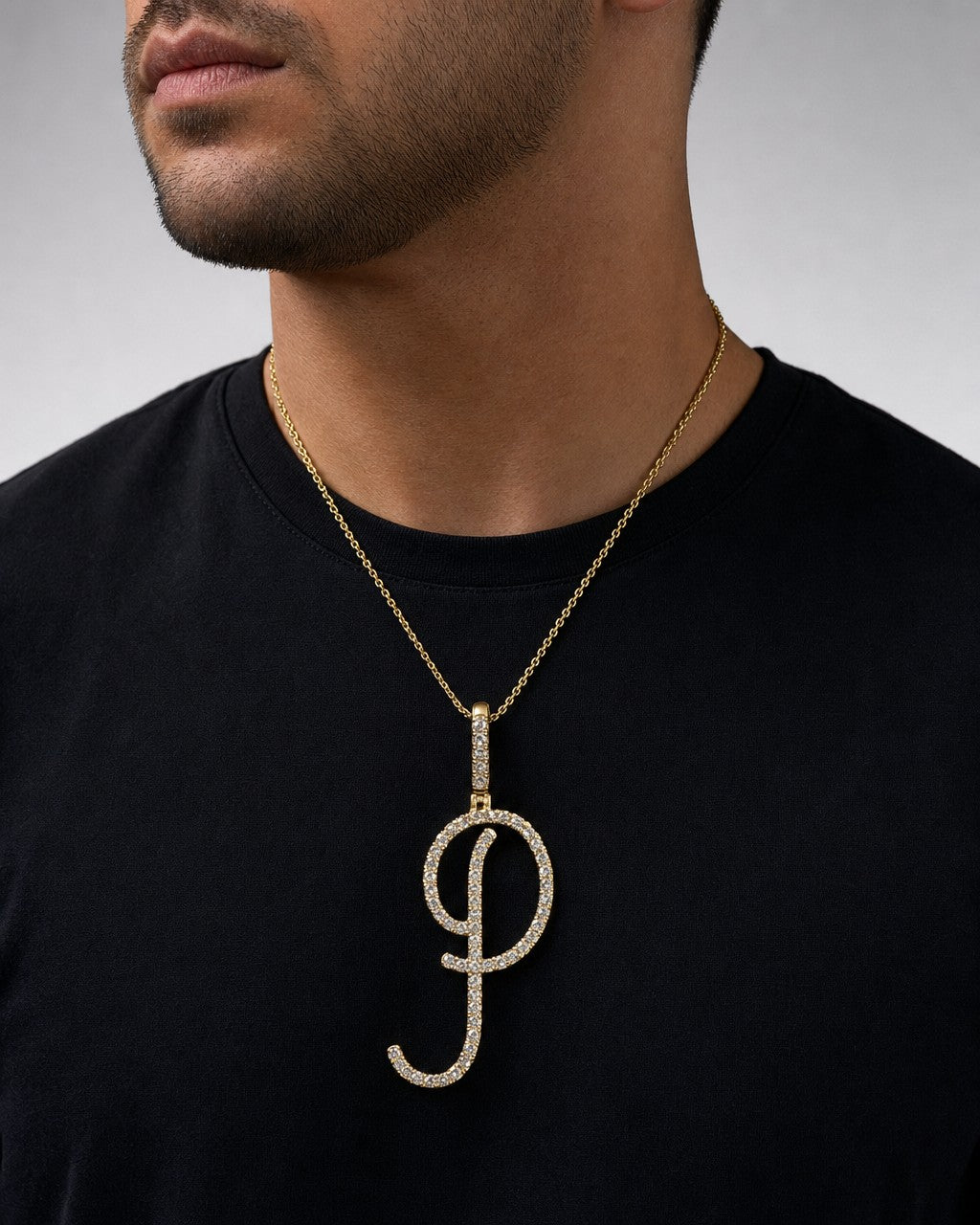 Male model wearing 14k Initial P Large Script Pendant