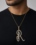 Male model wearing 14k Initial R Large Script Pendant