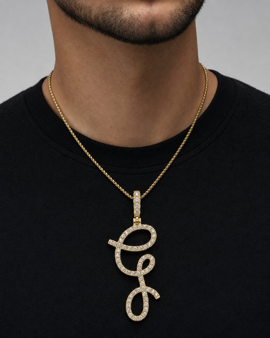 Male model wearing 14k Initial G Large Script Pendant