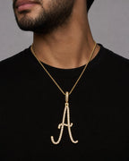 Male model wearing 14k Initial A Large Script Pendant