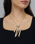 Female model wearing 14k Initial N Script Heart Pendant
