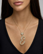Female model wearing 14k Initial E Script Heart Diamond Pendant