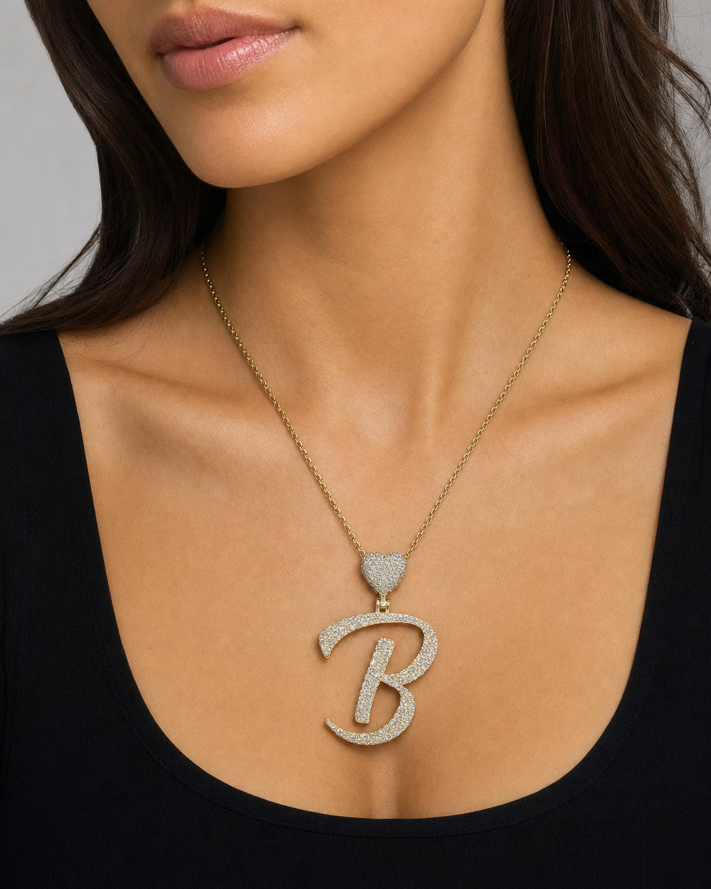 Female model wearing 14k Initial B Script Heart Diamond Pendant
