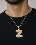 Male model wearing 14k Initial Z Bubble Pendant