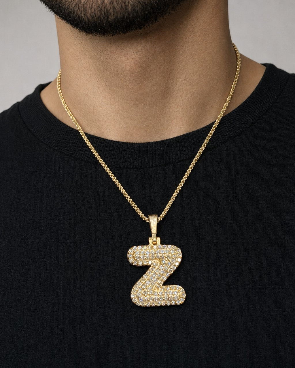 Male model wearing 14k Initial Z Bubble Pendant