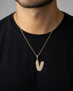 Male model wearing 14k Initial V Bubble Pendant