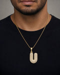 Male model wearing 14k Initial U Bubble Pendant