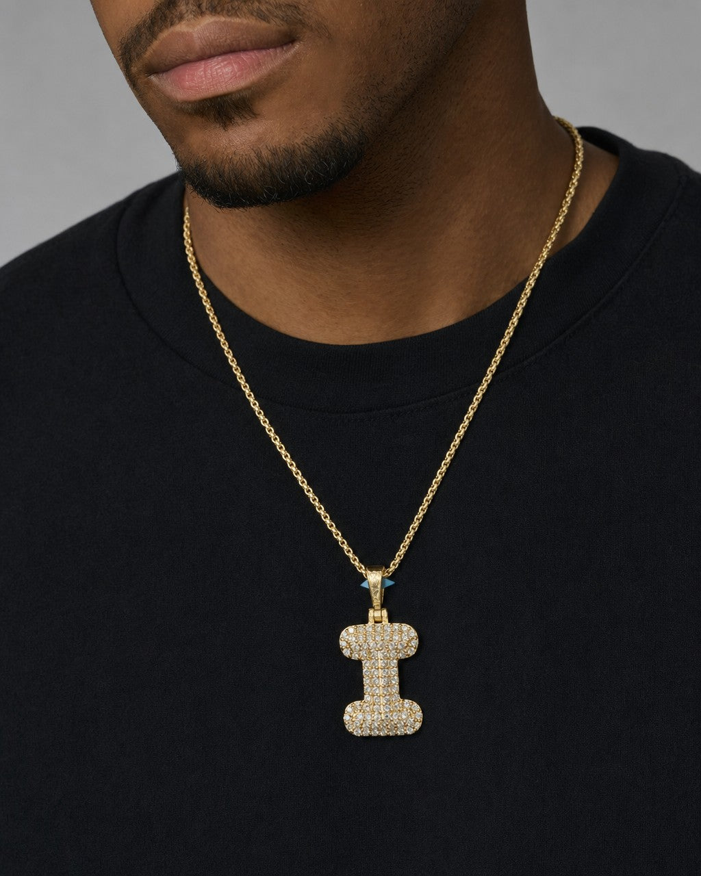 Male model wearing 14k Initial I Bubble Pendant