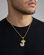 Male model wearing 14k Initial J Bubble Pendant