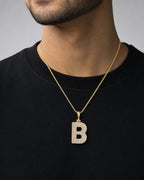 Male model wearing 14k Initial B Bubble Pendant