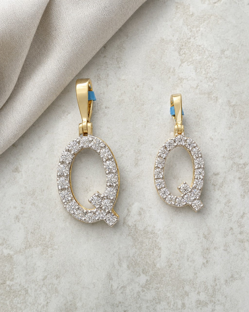 14k Single Stone Initial Q Pendant styled photo