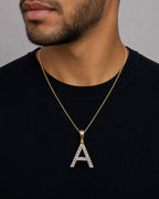 Male model wearing 14k Single Stone Initial A Pendant