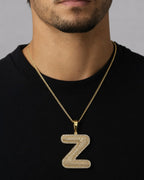 Male model wearing Initial Z Bubble Pendant