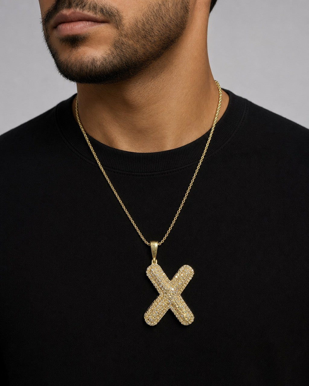 Male model wearing Initial X Bubble Pendant