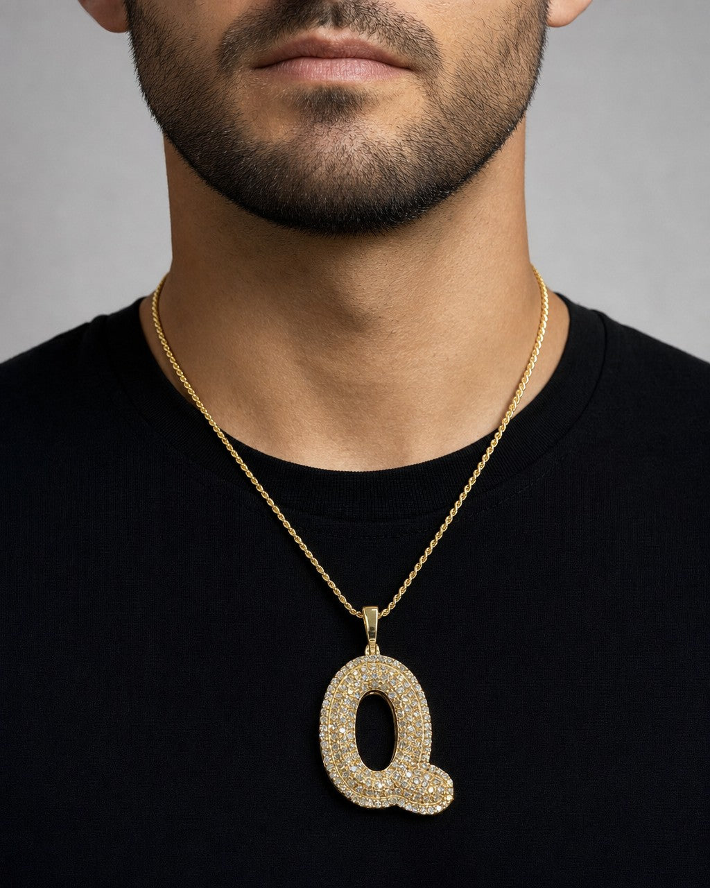 Male model wearing Initial Q Bubble Pendant