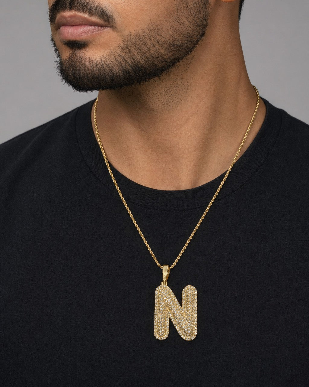 Male model wearing Initial N Bubble Pendant