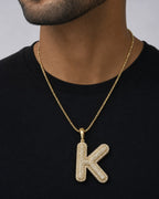 Male model wearing Initial K Bubble Pendant