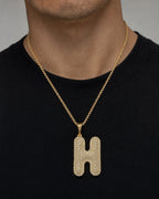 Male model wearing Initial H Bubble Pendant