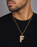 Male model wearing Initial F Bubble Pendant