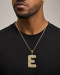 Male model wearing Initial E Bubble Pendant