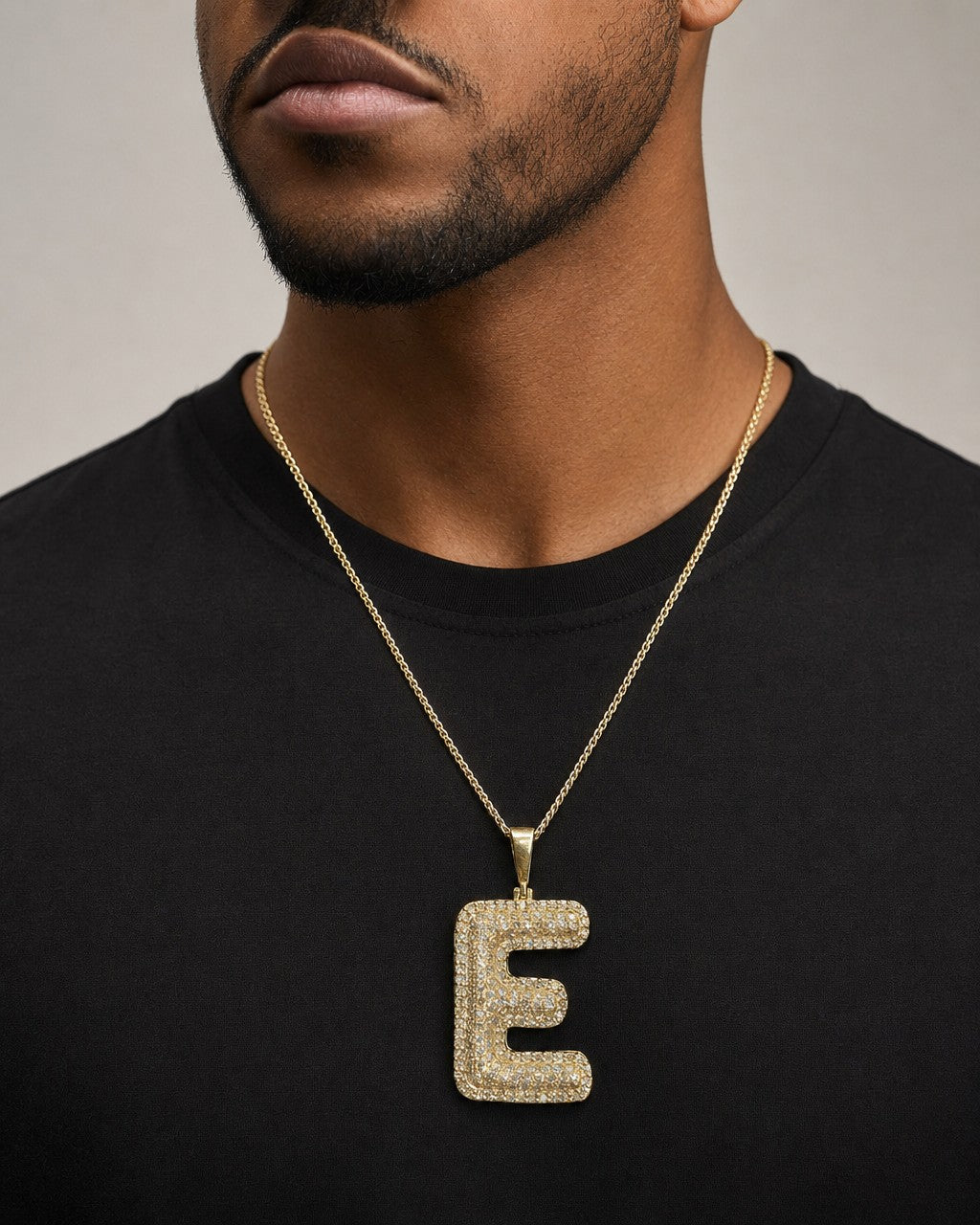 Male model wearing Initial E Bubble Pendant