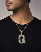 Male model wearing Initial Q Baguette Pendant