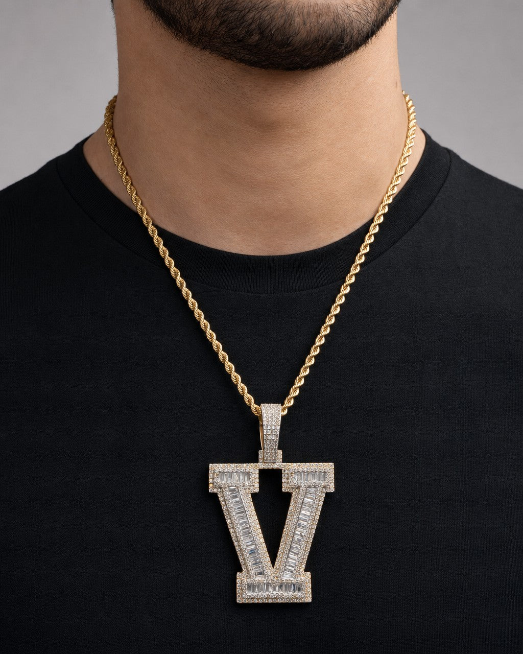 Male model wearing Initial V Baguette Pendant