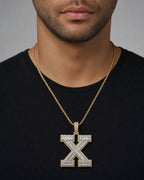 Male model wearing Initial X Baguette Pendant