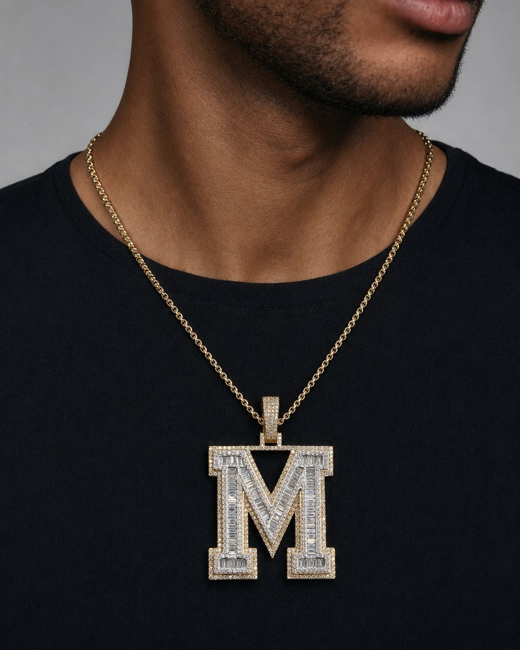 Male model wearing Initial M Baguette Pendant