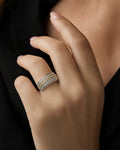 Female model wearing 14K Eternity Three Row Diamond Ring