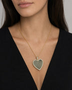 Female model wearing 14K Heart Picture Pendant