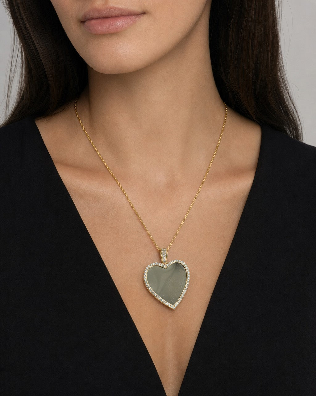 Female model wearing 14K Heart Picture Pendant