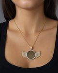 Female model wearing 14K Angel Wings Round Picture Pendant