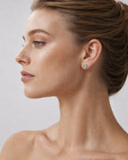 Female model wearing 14K Diamond Baguette Stud Earrings