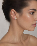 Female model wearing 14K Rounded Rectangle Diamond Baguette Earrings 0.75ct