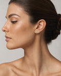 Female model wearing 14K Square Flat Diamond Earrings