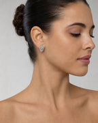 Female model wearing 14K Eye Diamond Baguette Earrings