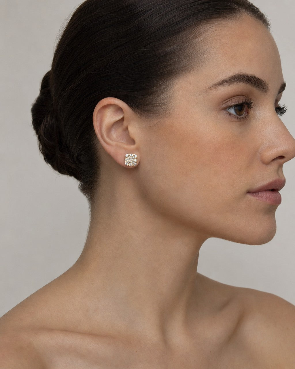 Female model wearing 14K Square Stud Diamond Earrings 1.7ct