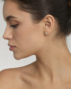Female model wearing 14K Big Rocks Square Diamond Earrings