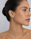 Female model wearing 14K Suave Square Diamond Earrings