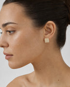 Female model wearing 14K Classic Square Earrings