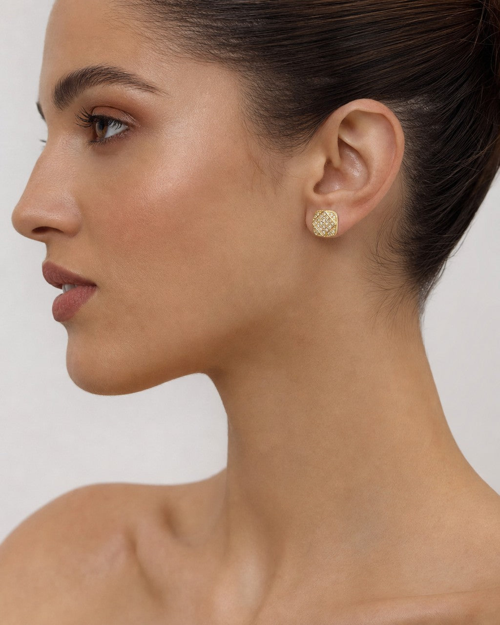 Female model wearing 14K Square Infinity Diamond Earrings Large