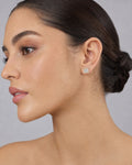 Female model wearing 10K Square Diamond Earrings 0.4ct