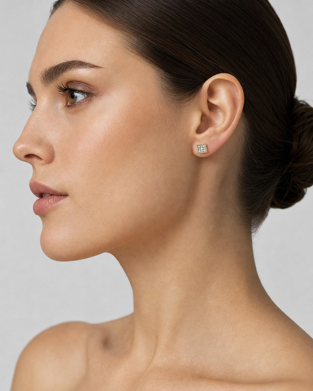 Female model wearing 10K Square Diamond Earrings 0.1ct