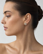 Female model wearing 14K Thick Circle Double Layer Cake Diamond Earrings 2.2 CT