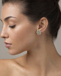Female model wearing 14K Flower Diamond Earrings 5.3ct